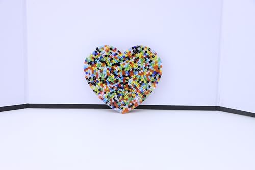 RadBizz Picky Pad silicone surface with raised dots and grooves for squeezing.