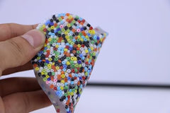 RadBizz Picky Pad silicone surface with raised dots for tactile squeezing and pinching