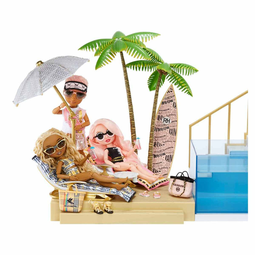 Rainbow High palm trees and wood deck elevate coastal storytelling.