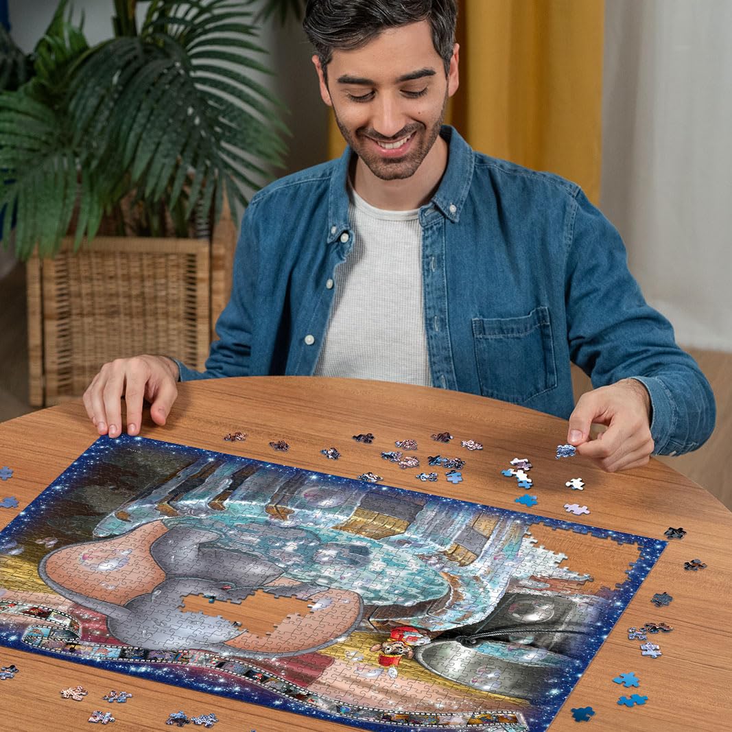 Ravensburger Dumbo puzzle close-up of iconic ears in vibrant colors.