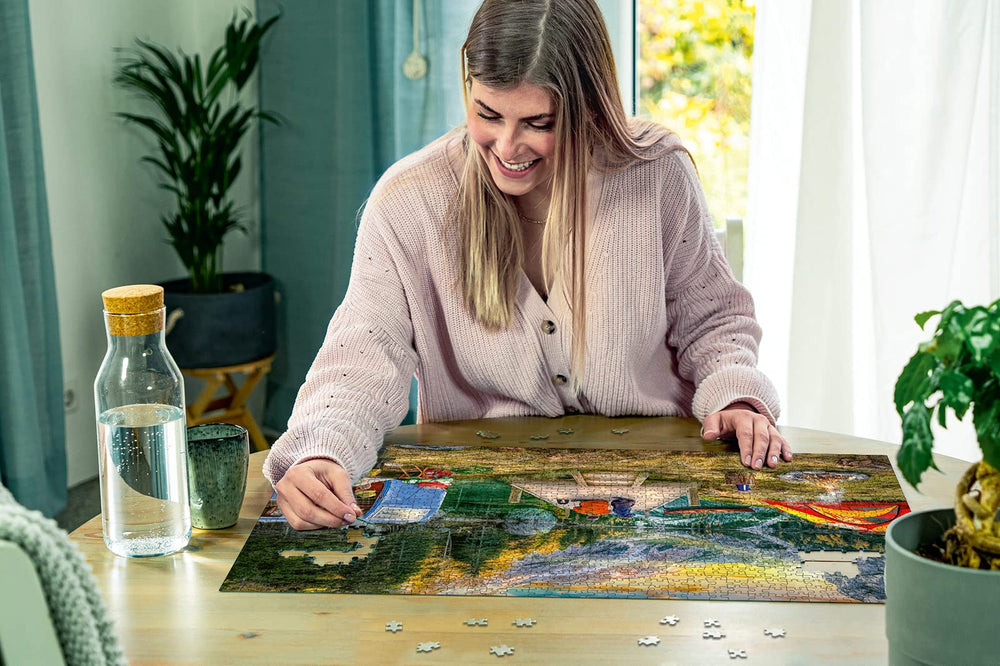 Finished Ravensburger Calm Campsite puzzle measures 70 by 50 cm, ideal for display.