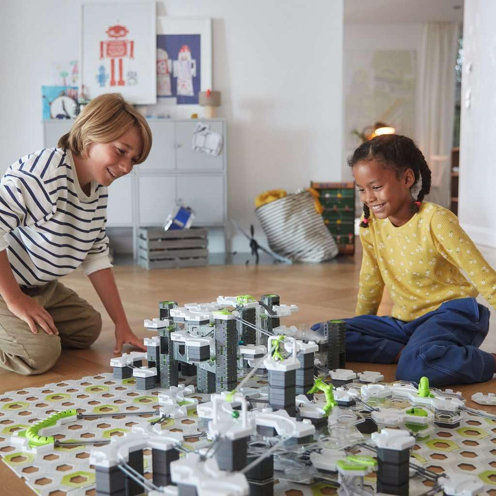 Ravensburger GraviTrax Pro family play set inspires collaborative problem solving.