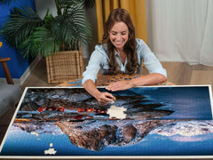 Ravensburger Hamnoy glare-free finish on linen paper with rich color.