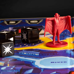 Ravensburger Horrified tokens and dice capture tactile action during play.