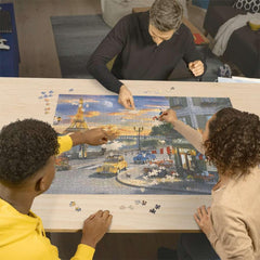 Ravensburger Paris Sunset linen finish reduces glare for smooth assembly.