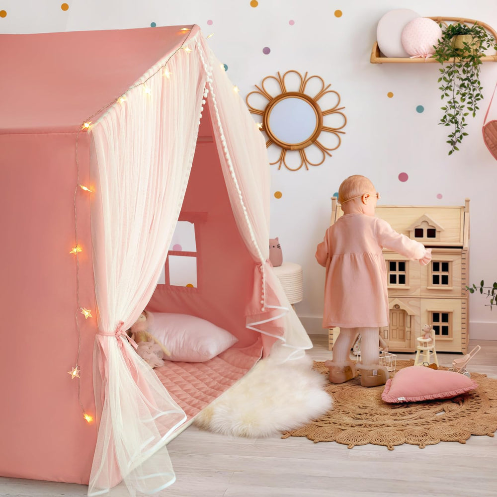 Razee pink large play cottage creates a vibrant centerpiece for play and birthdays.