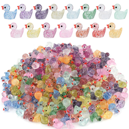 Rclxl mini glitter ducks in varied colors for dollhouse decor and playful scenes.