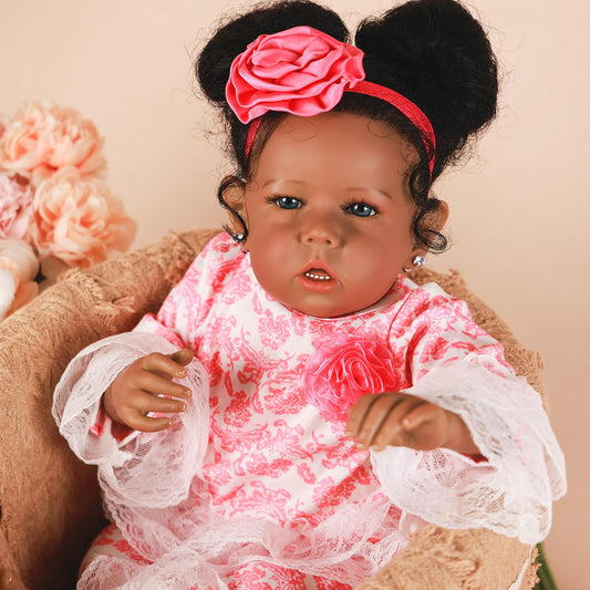 Rebornova black girl doll face closeup showing lifelike features for imaginative play