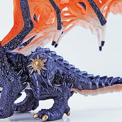 RECUR Devil Dragon figurine close-up showing detailed claws and texture.