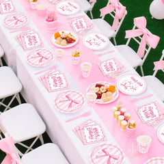 REDWORD pink bow party setup creates a cohesive, joyful celebration.
