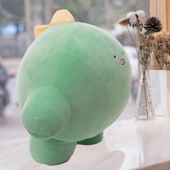 REFAHB cozy decor scene with 9-inch dinosaur plush in bedroom