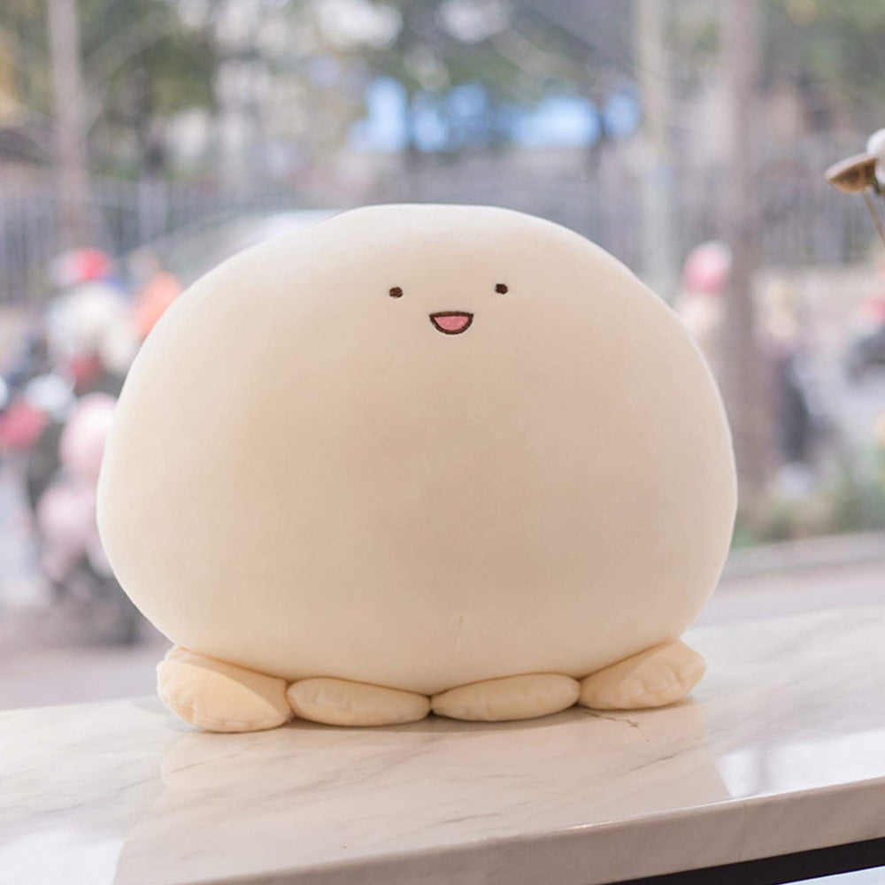 REFAHB plush toy in a bed decor setting adding playful charm