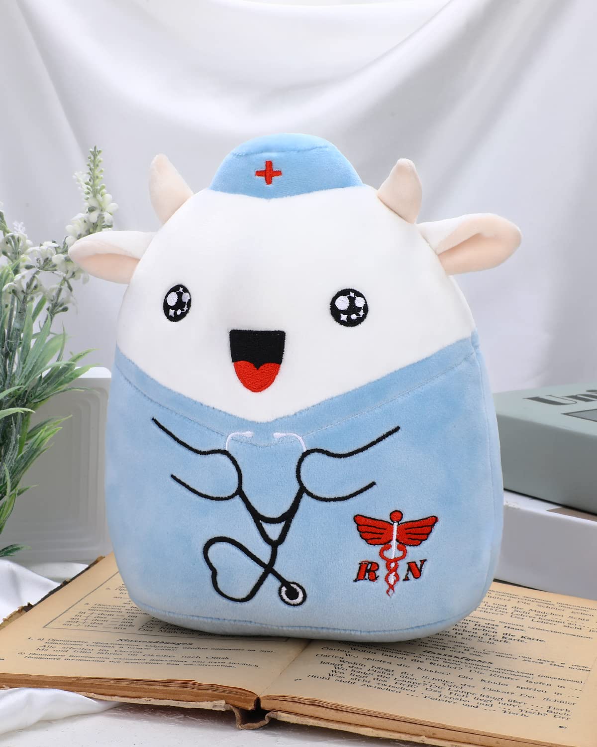 Refavor Nurse Cow plush logo on hat emphasizes nursing theme for gifting.