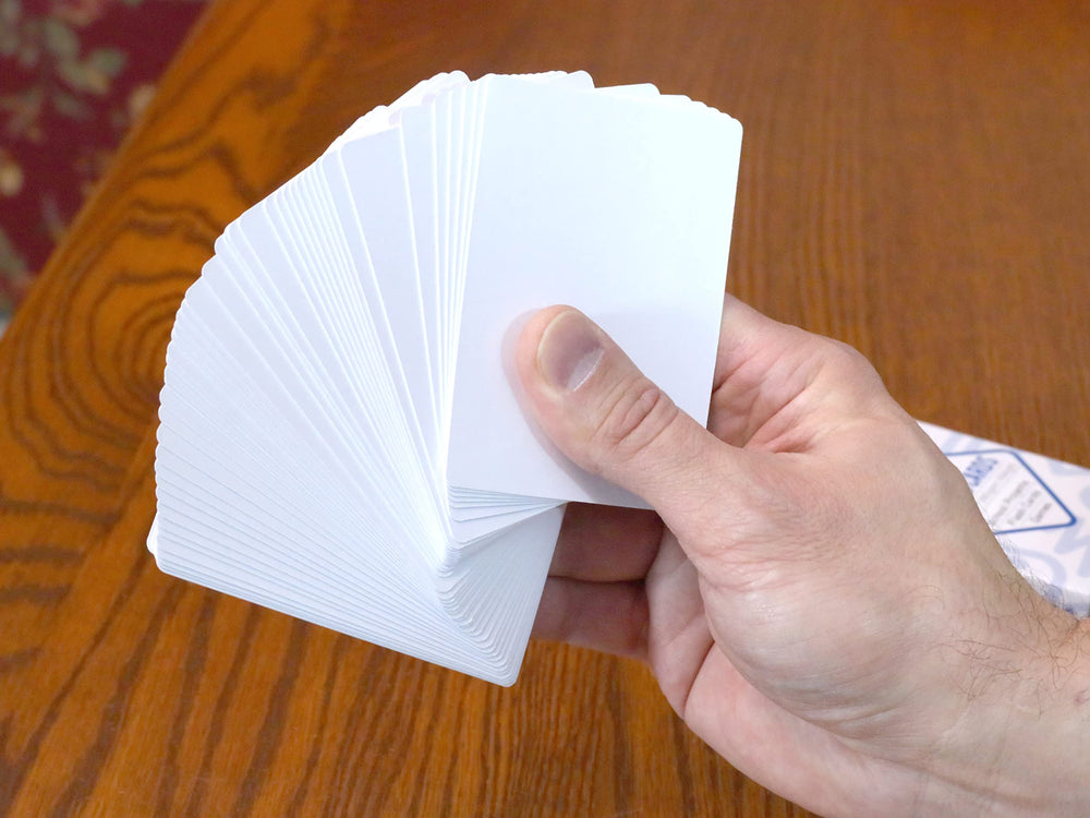 Regal Games cards measure 2.5 x 3.5 inches, compact for easy handling.