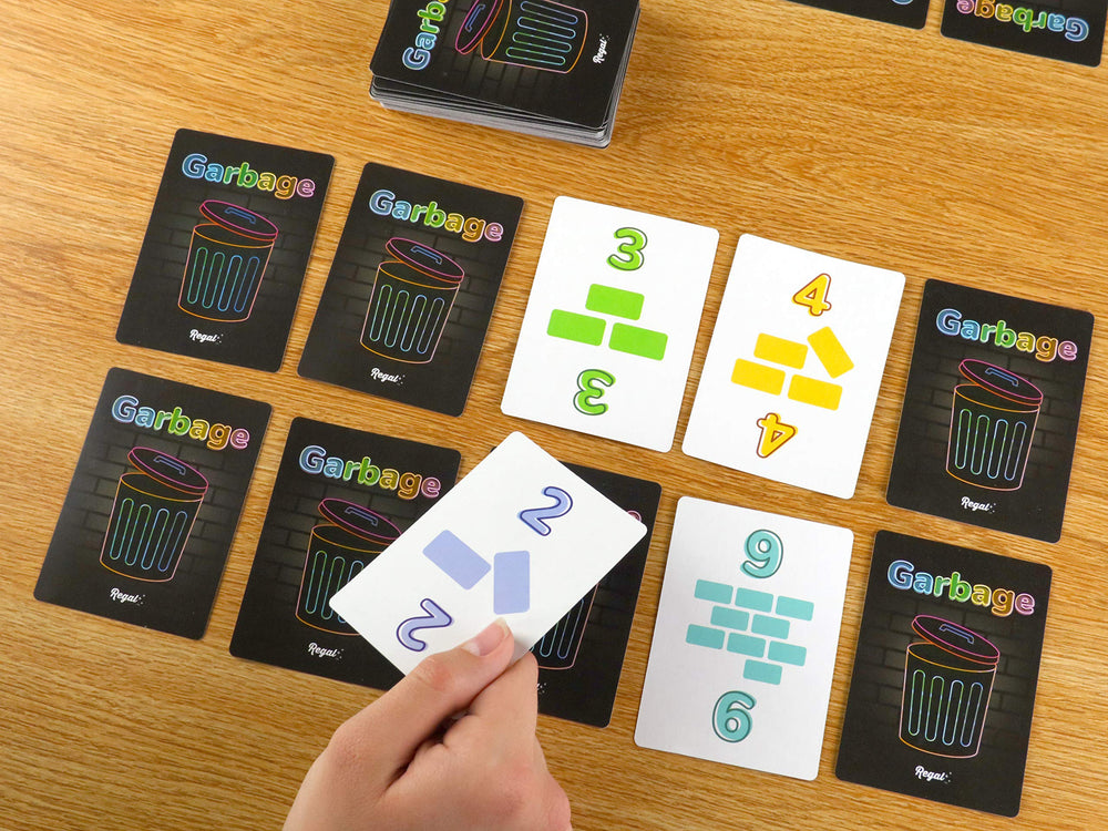 Regal Games Garbage Monsters compact travel case for on-the-go fun.