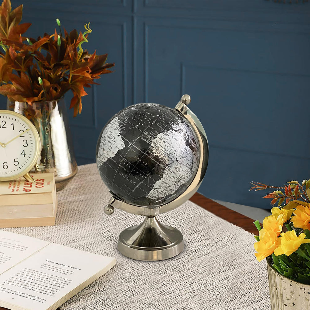 Rely+ black globe on bookcase adds focal interest to a room.