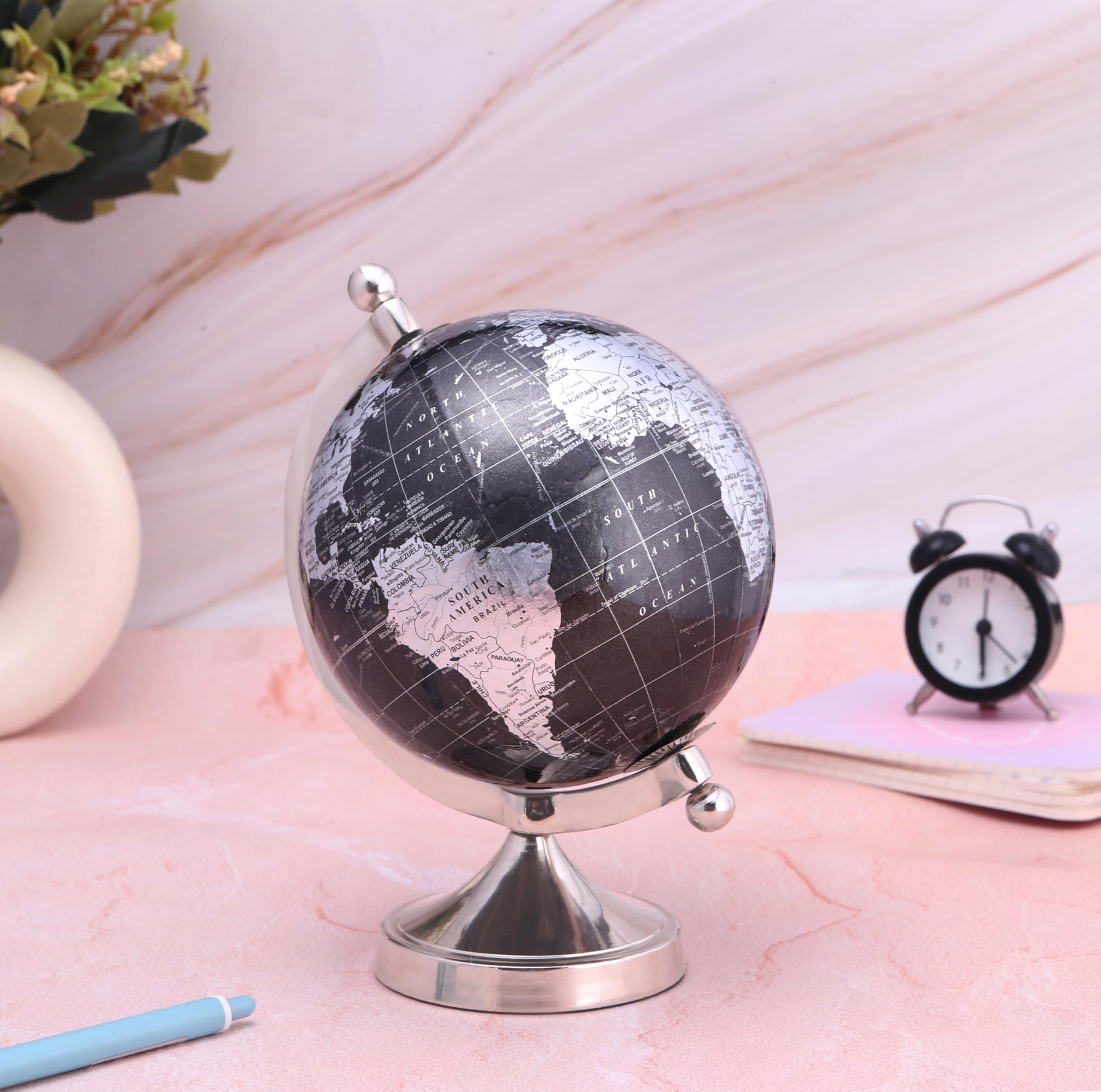 Rely+ desk globe on shelf enhances workspace with modern accents.