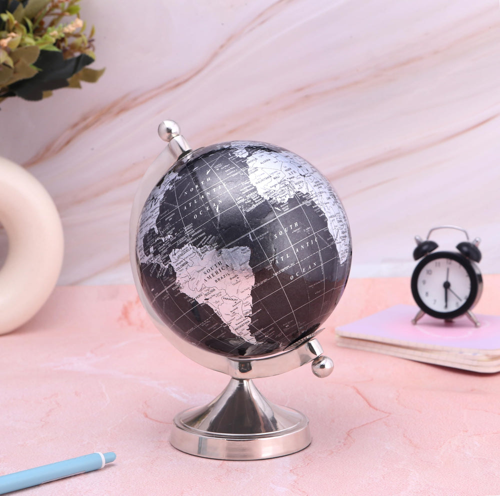 Rely+ desk globe on shelf enhances workspace with modern accents.