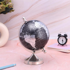 Rely+ desk globe on shelf enhances workspace with modern accents.