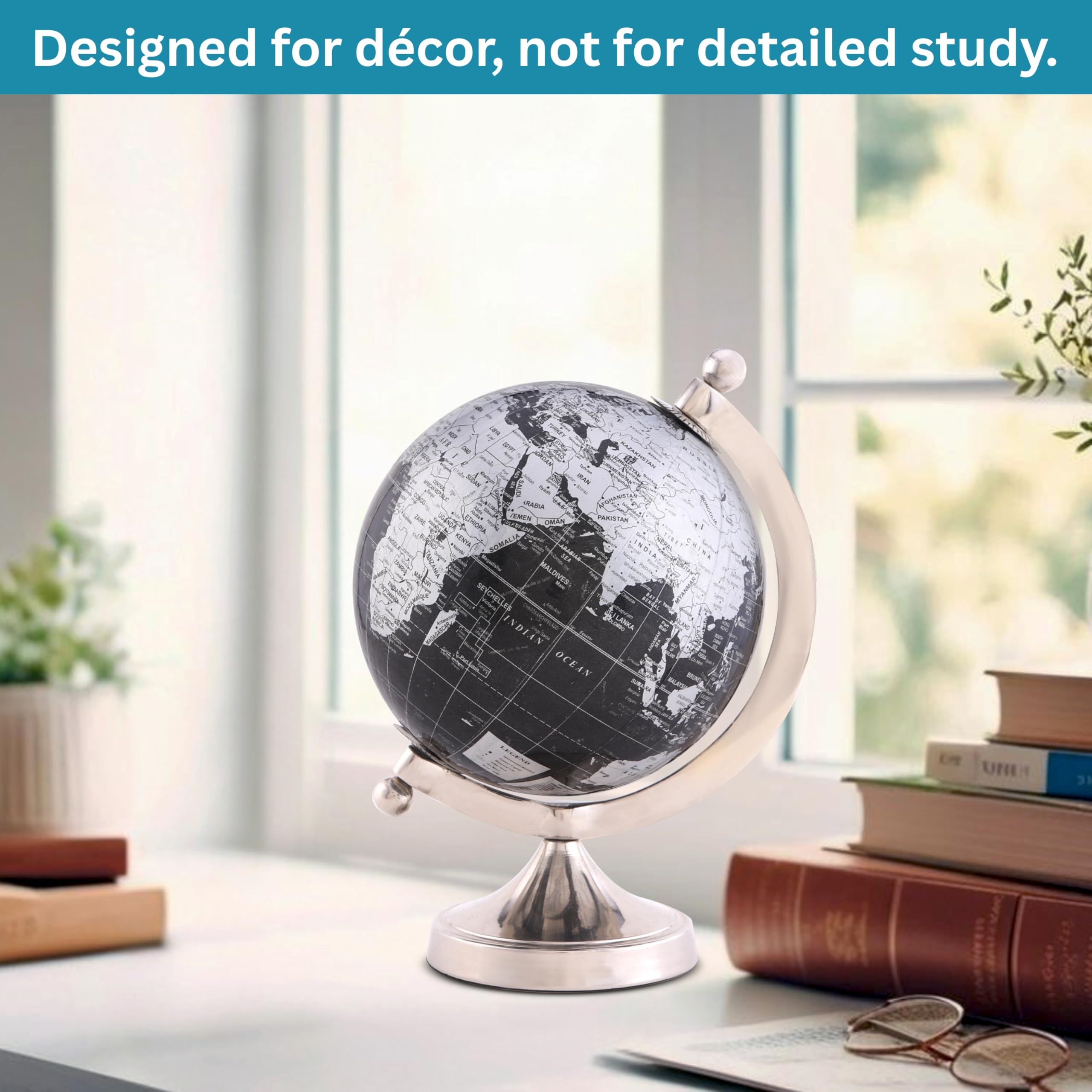 Rely+ globe with silver stand closeup highlights contemporary design.