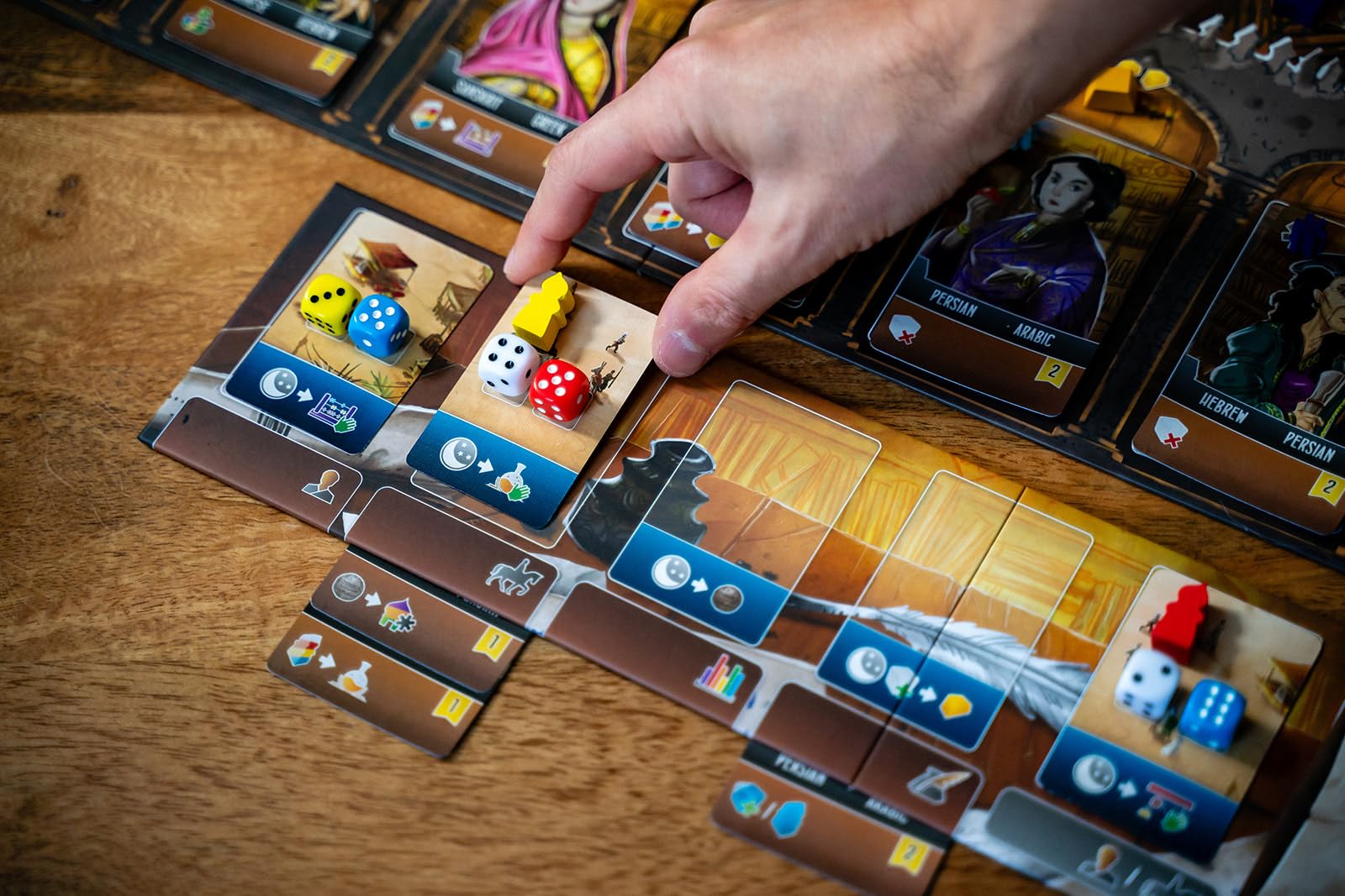 Dice placement in Scholars of the South Tigris clarifies actions and pacing.