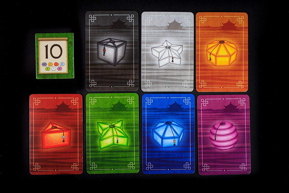 Renegade Lanterns engraved wood favor tokens: tactile rewards for trading decisions.