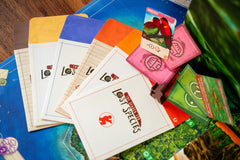 Renegade Game Studios The Search for Lost Species note sheets—record clues and eco-focused observations.