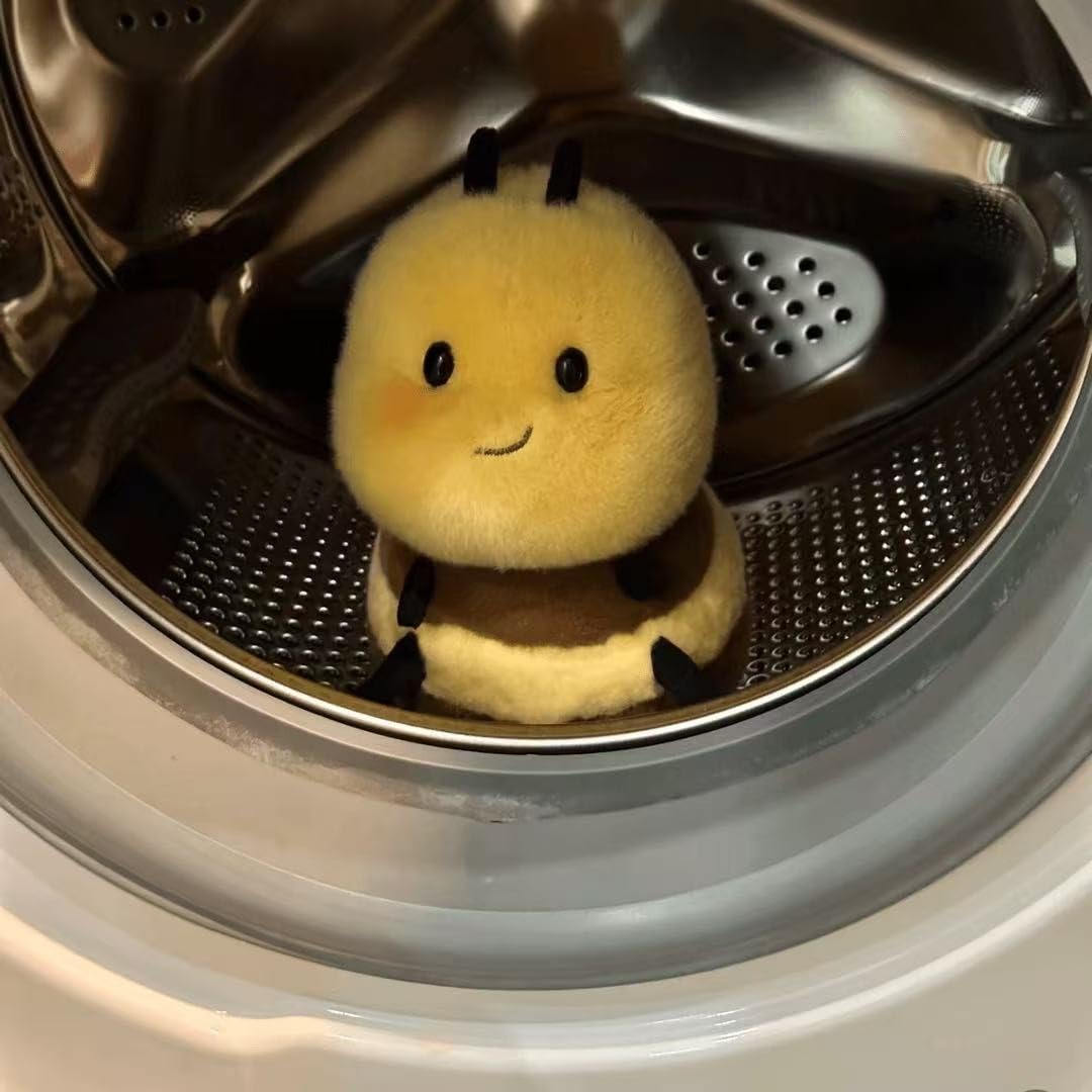 RHHSSE Bee plush as a bedtime companion on a cozy nightstand.