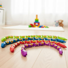 Rhode Island Novelty 15in green jointed snake coil for classroom rewards