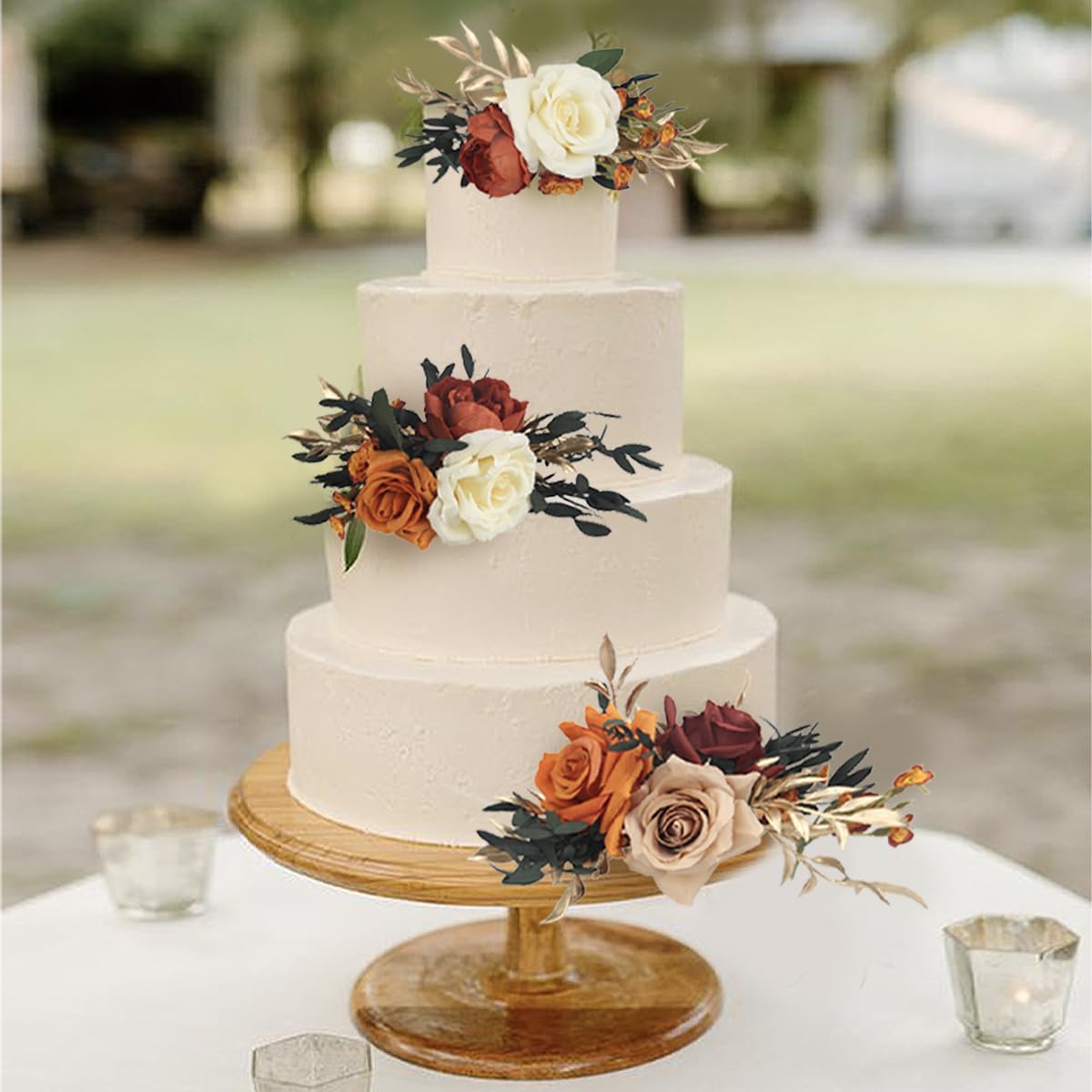 Rinlong boho cake topper in burnt orange and gold enhances fall wedding decor