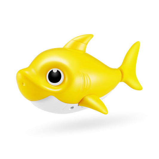 Robo Alive Junior Baby Shark yellow swimming in tub for immersive bath play.