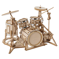 Robotime drum kit parts laid out for easy assembly and focus