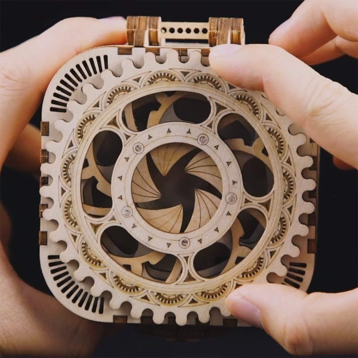 ROKR 3D wooden puzzle box bottom engraving detailing how to enter digits to open.