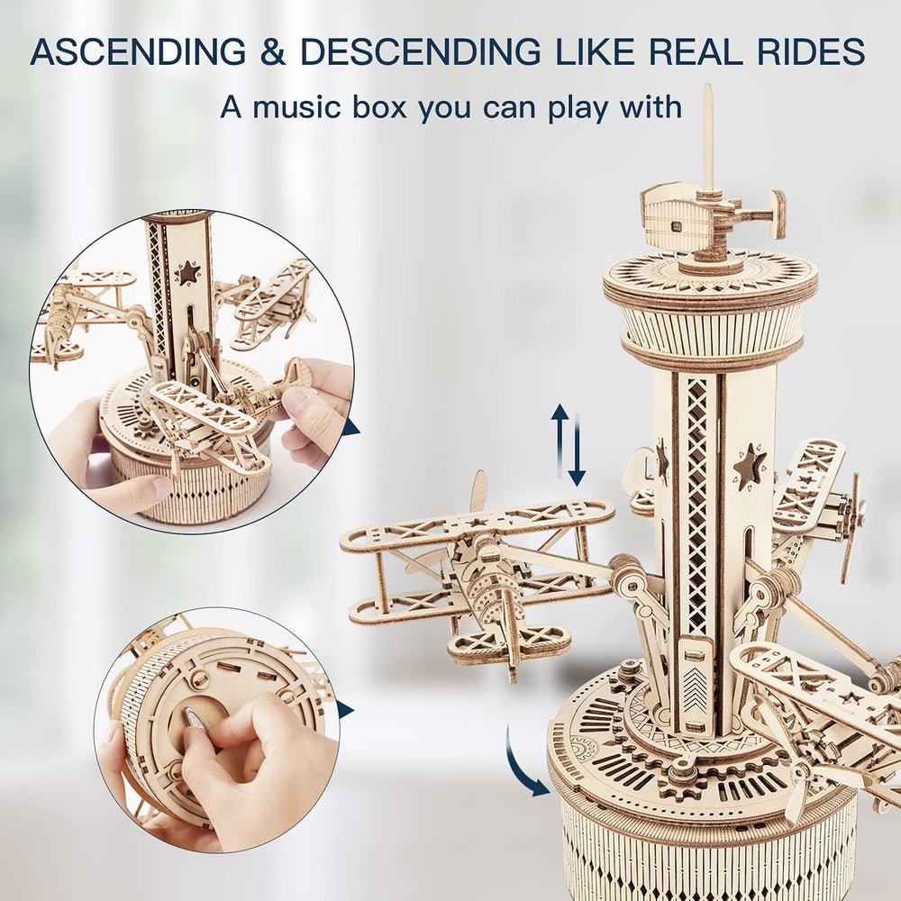 ROKR airplane tower music box mechanism closeup highlights gears and turning action
