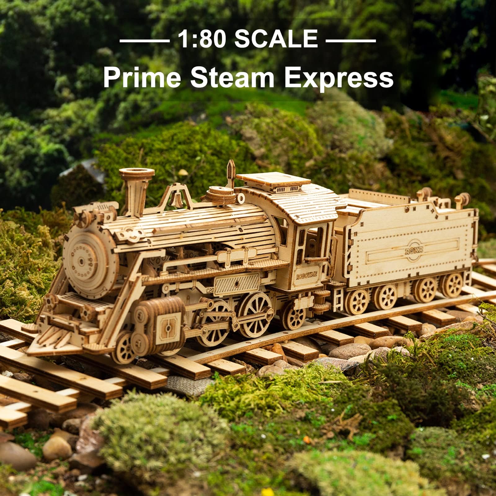 ROKR steam train model with carriage displayed on a desk for decor.