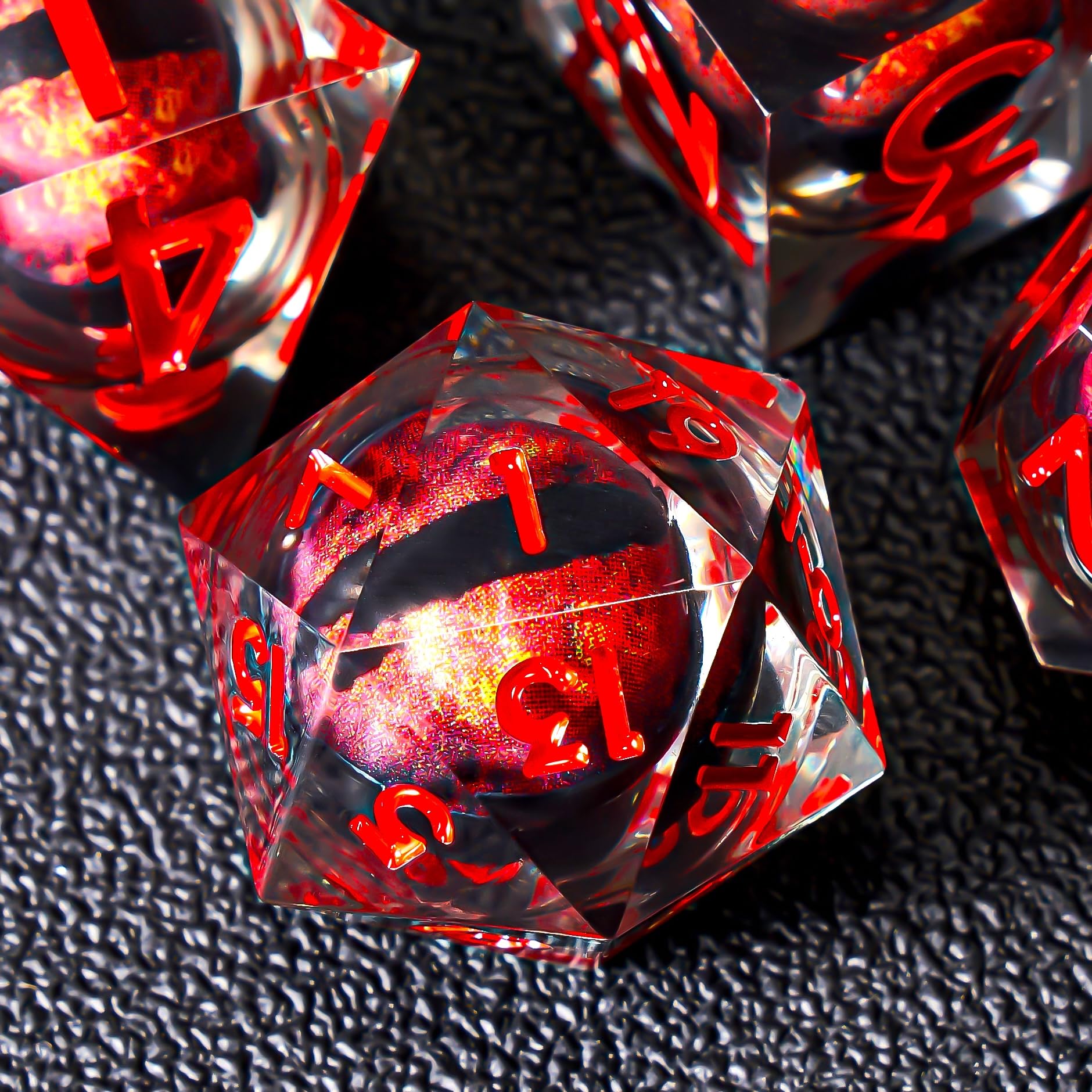 Role dice Dragon Eye DND 7pc set features clear numerals on red resin for easy targeting.