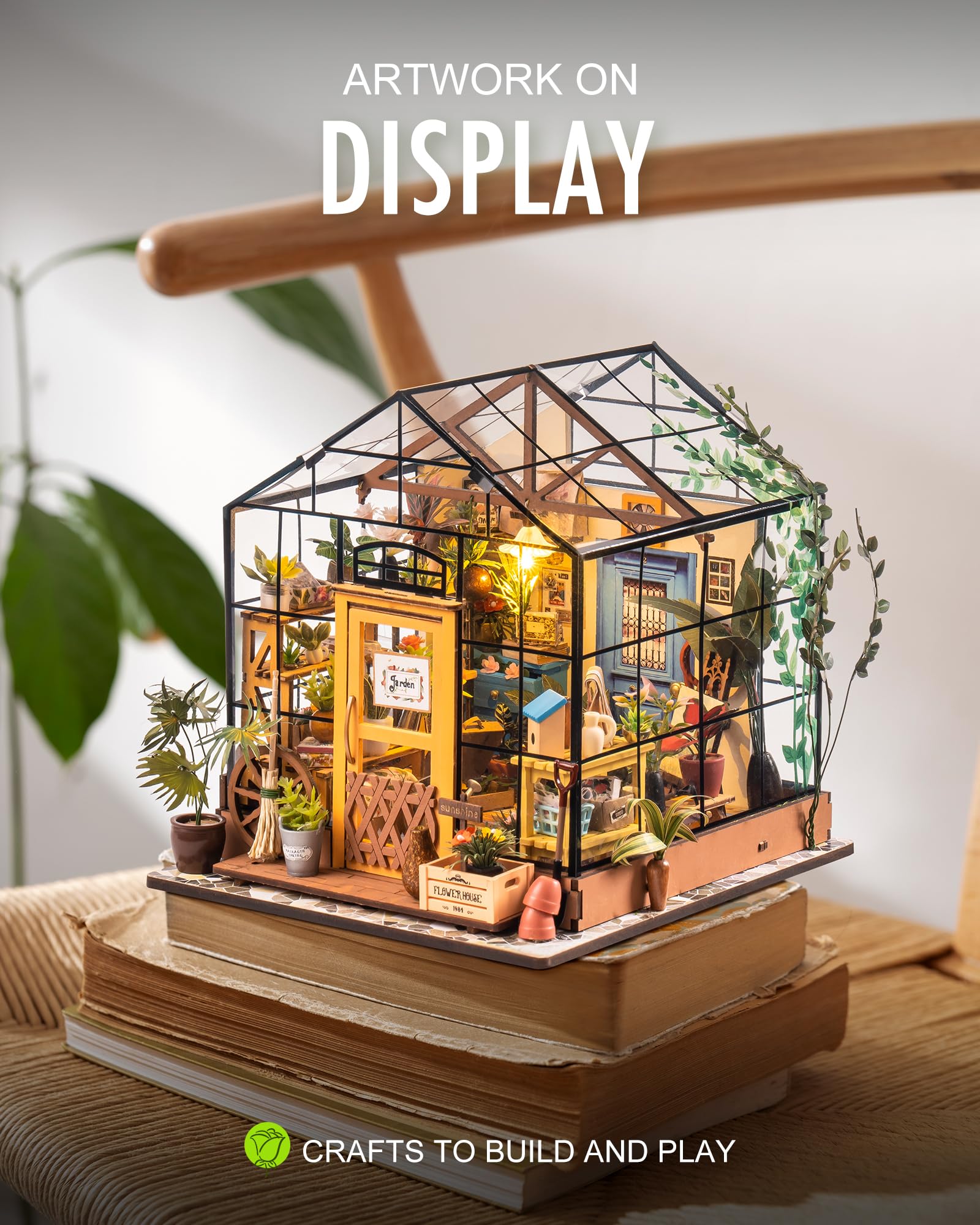 Rolife Cathy’s Greenhouse interior with tiny plants, perfect for a cozy corner.