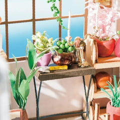 Rolife Flower Shop dollhouse furniture featuring miniature seating and blooms