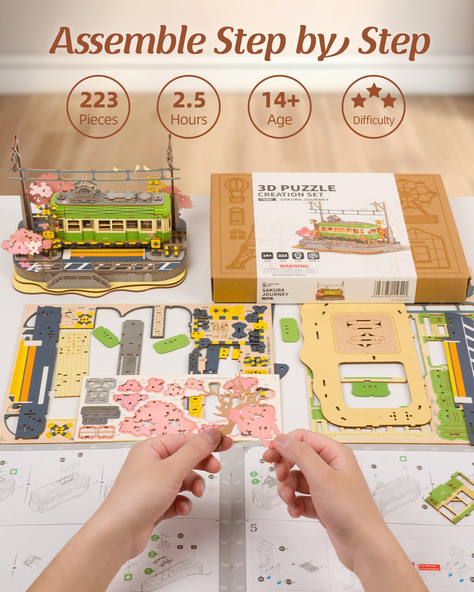 Rolife Sakura Journey Tram in-progress shot highlights snap-fit steps.