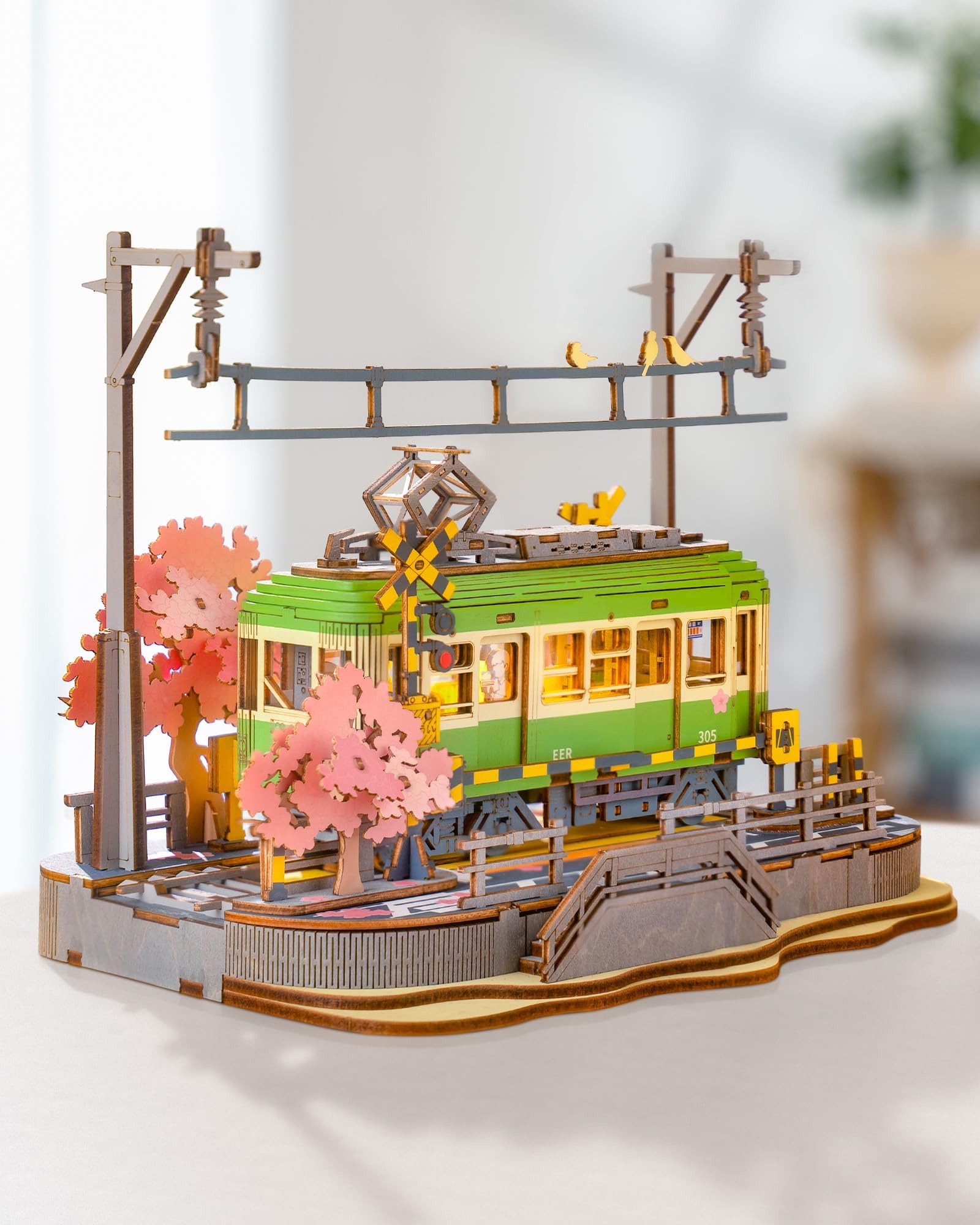 Rolife Sakura Journey Tram packaging shows gift-ready presentation.