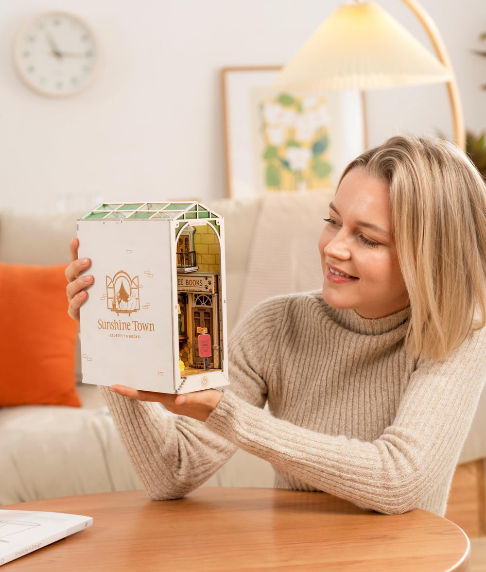Rolife Sunshine Town clock scene, adds charming timepiece to your bookshelf display.