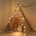 RONGFA Kids Teepee Tent with lights and pompoms for cozy indoor play.