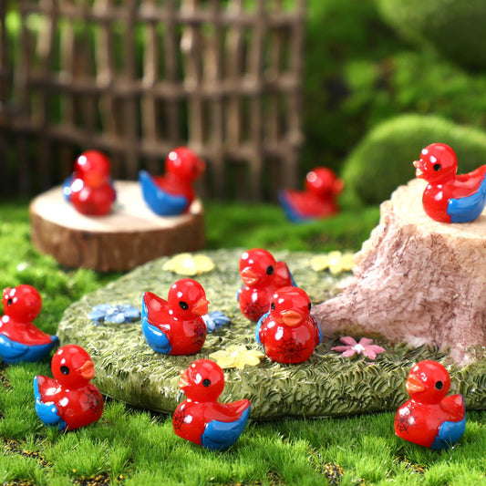RoundFunny spiderweb duck mini figure on shelf decor, adding whimsy.