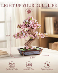 Rowood Bonsai tree base with layered moss adds realistic depth.
