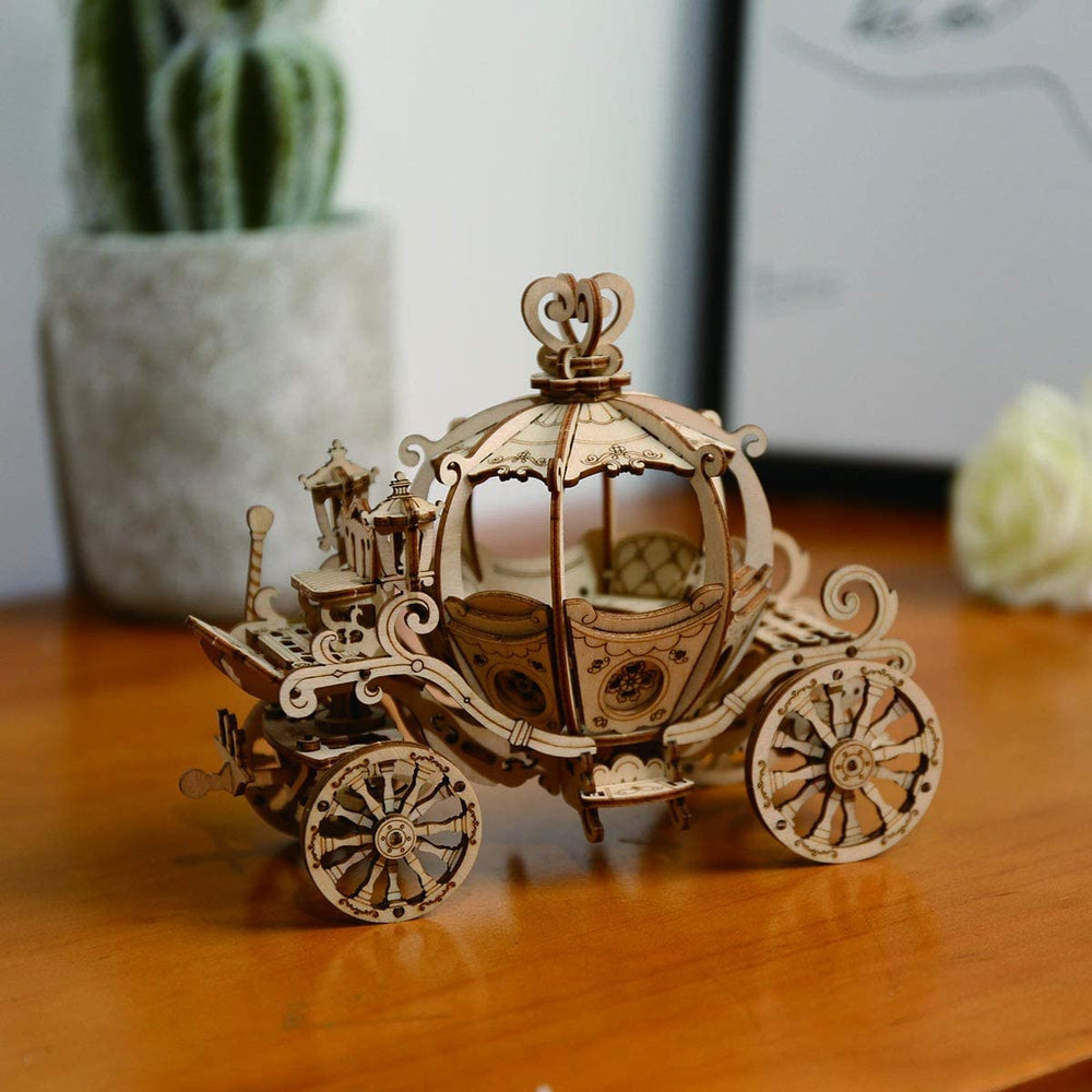 Rowood Pumpkin Cart laser-cut wooden parts laid out for assembly and planning