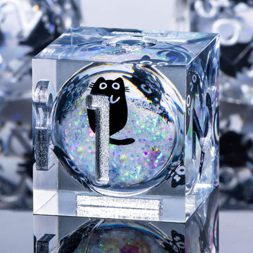Roycevon liquid-core cat dice close-up showing clear surface and color.