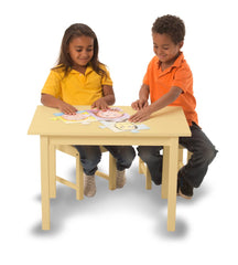 Roylco write-on puzzle pieces invite kids to draw, write vocabulary, and create custom puzzles.