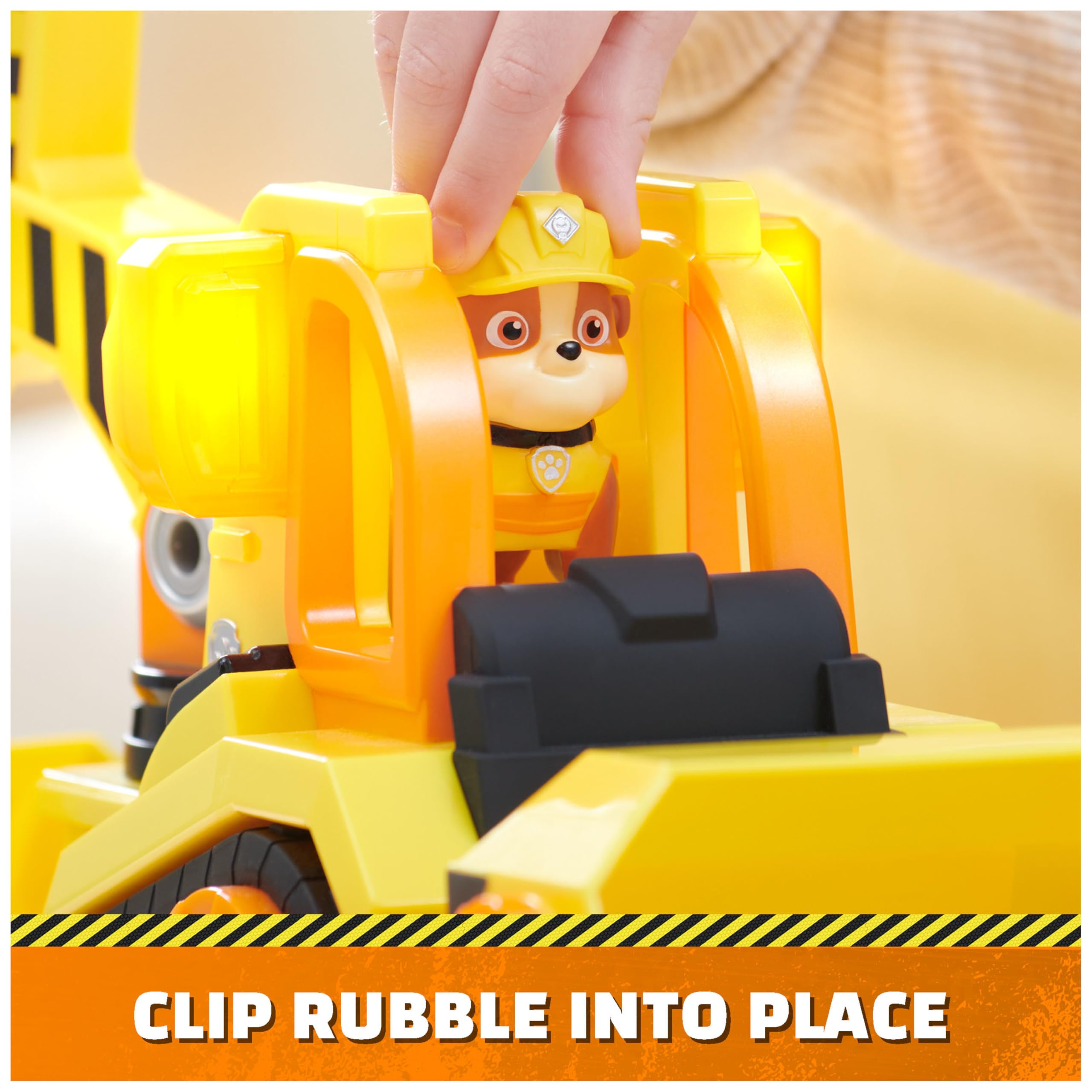 Rubble & Crew Bark Yard Deluxe Bulldozer driver seat click action for lights and sounds.