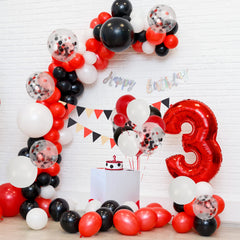 RUBFAC gift table decorated with balloon arch and coordinating colors