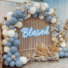 Rubfac balloon garland arch setup shows how haze blue shades brighten venues.